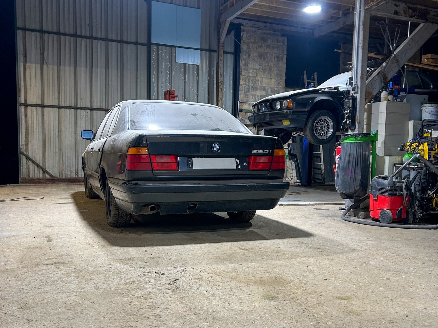 BMW Série 5 E34 520i à l'atelier Gendre Auto Services